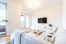 Wohnzimmer Tr�umen Sie sich schon mal rein - Moderne 3-Zimmer-Wohnung in Langenfeld.