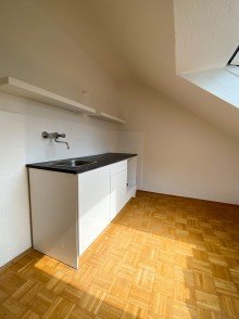 K�chenzeile Freundliche 1-Zimmer-Dachgeschosswohnung in zentraler Lage